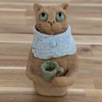 Ceramic mug holding a mug