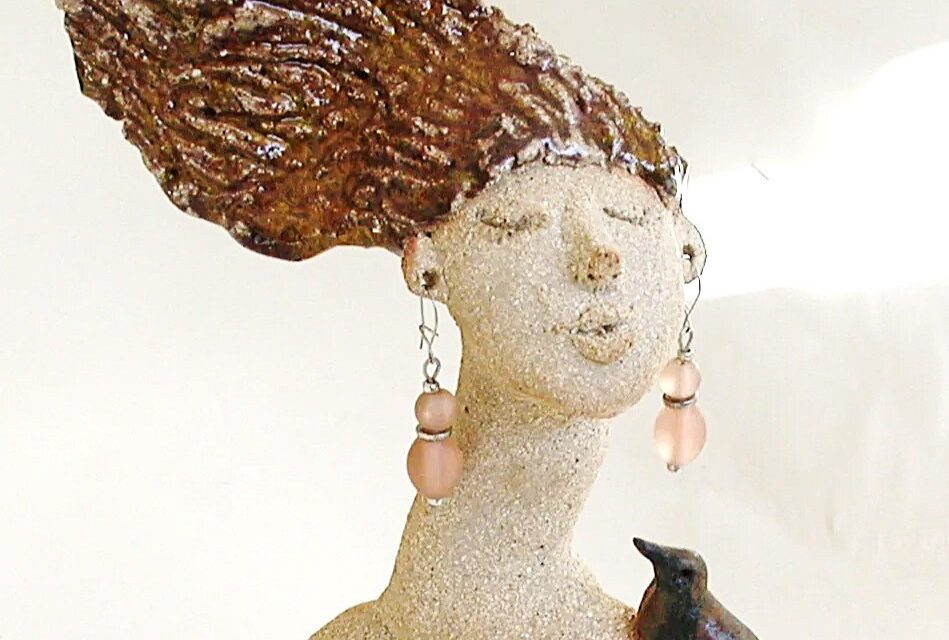 ceramic figure with Cornish chough's