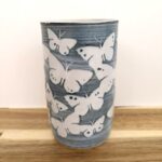 Vase with butterfly design